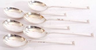 George VI set of six silver dessert spoons of plain polished design with tapering angular handles