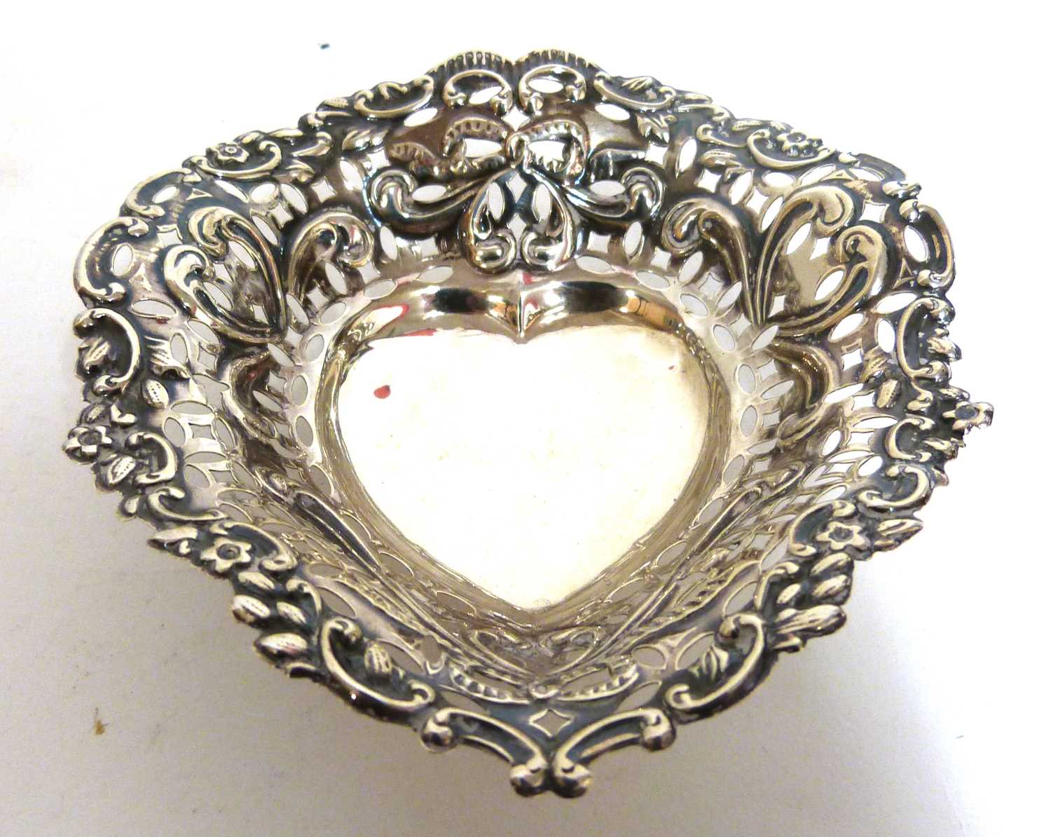 Late Victorian pierced and embossed bon-bon dish of heart shape with plain centre and raised on - Image 4 of 4