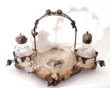 Mid/late Victorian period electro-plated strawberry stand of quatrefoil design with arched wire work