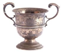 Victorian twin handled silver pedestal trophy, the baluster body with presentation engraving dated