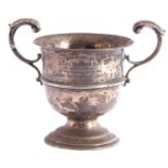 Victorian twin handled silver pedestal trophy, the baluster body with presentation engraving dated