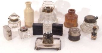 Interesting collection of four late Victorian/early 20th century moulded glass inkwells with