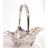 Edwardian silver bon-bon basket, the geometric pierced design body with an applied pierced and