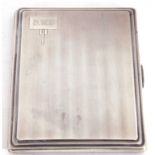 Art Deco silver cigarette case of rectangular form, engine turned decoration with engraved cartouche