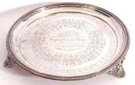 Victorian small silver salver of circular form, raised gadrooned rim, presentation engraved within a