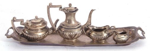 Edwardian miniature silver bachelor's tea set comprising coffee pot, tea pot, cream and sugar,