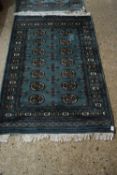 SMALL BOKHARA TYPE MODERN FLOOR RUG SET WITH LOZENGES ON A TURQUOISE BACKGROUND, 145CM LONG