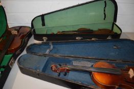 THREE CASED VIOLINS