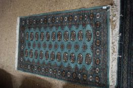 SMALL BOKHARA TYPE MODERN FLOOR RUG SET WITH LOZENGES ON A TURQUOISE BACKGROUND, 145CM LONG