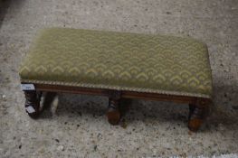 SMALL FABRIC UPHOLSTERED FOOT STOOL ON TURNED WOODEN FRAME, 52CM WIDE