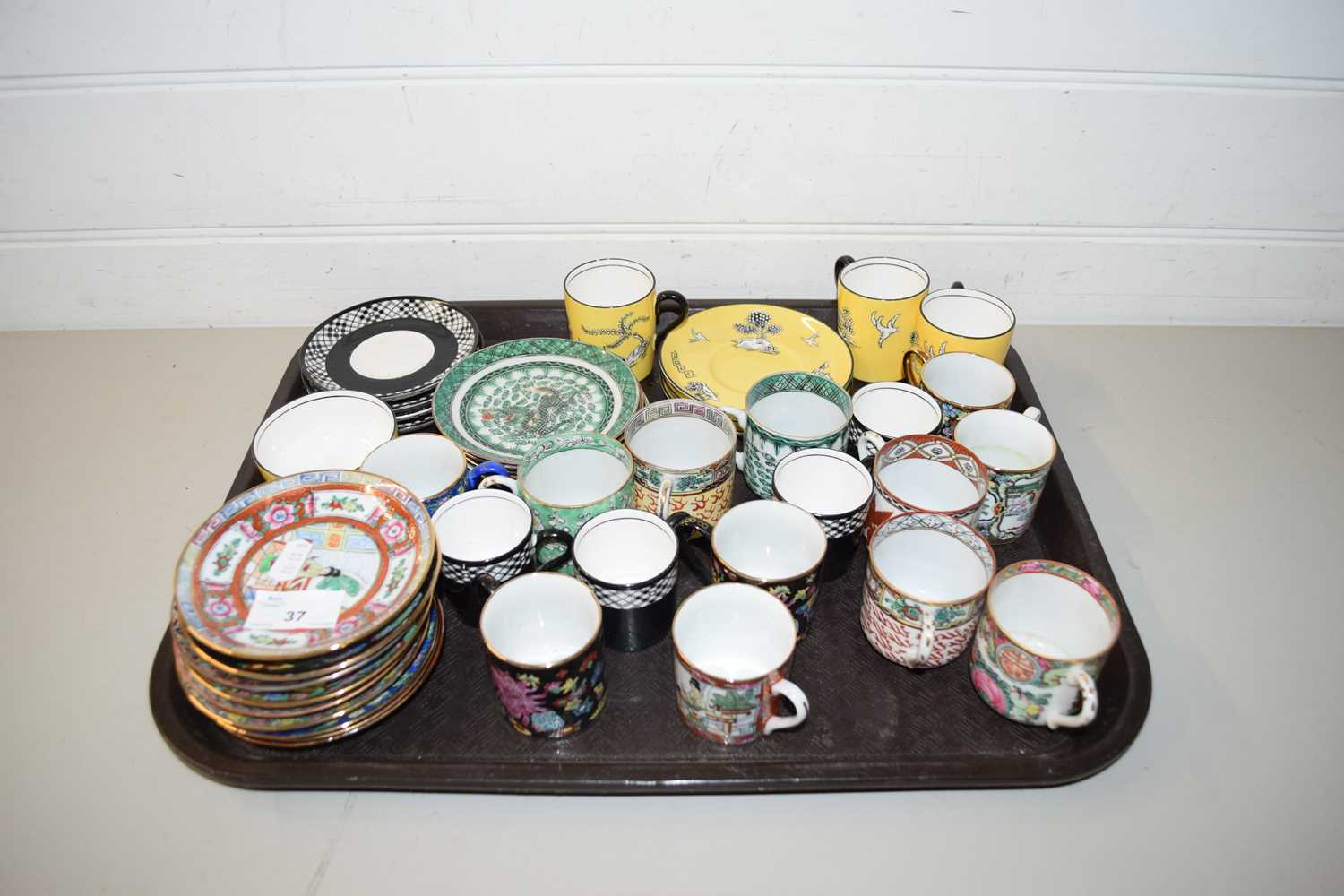 TRAY CONTAINING COLLECTION OF VARIOUS COFFEE CANS AND SAUCERS