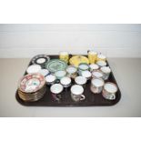 TRAY CONTAINING COLLECTION OF VARIOUS COFFEE CANS AND SAUCERS