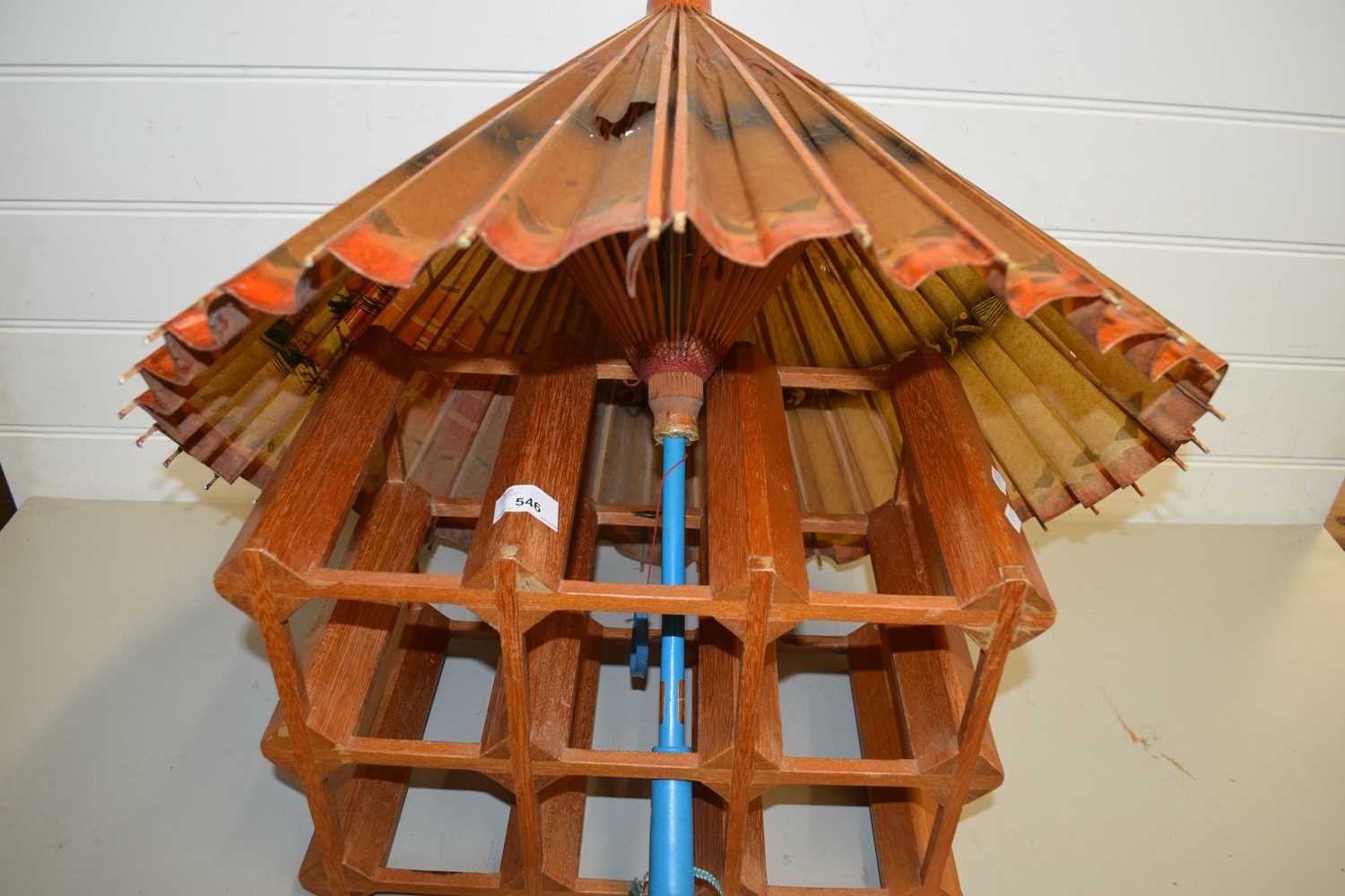 ORIENTAL PARASOL AND A WOODEN WINE RACK