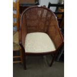 20TH CENTURY HARDWOOD FRAMED AND CANE TUB CHAIR