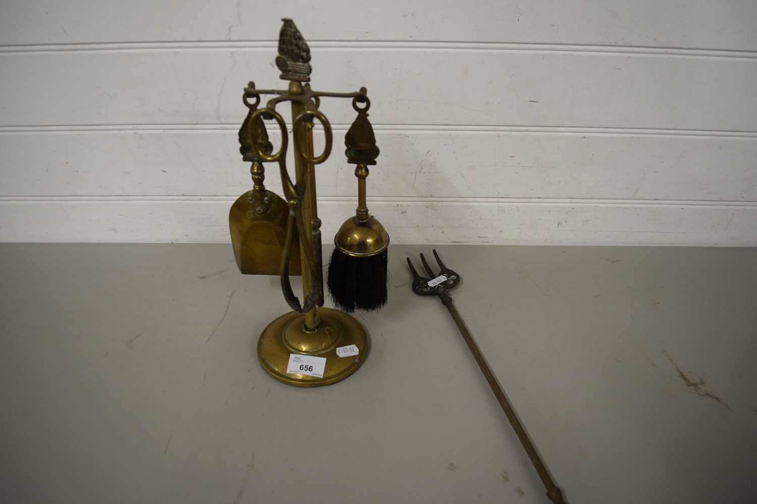 BRASS FIRE COMPANION SET AND A TOASTING FORK