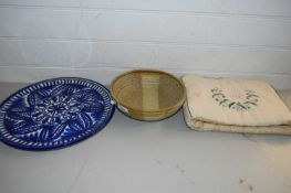 MIXED LOT COMPRISING A STUDIO POTTERY BOWL, TEA COSY AND A FURTHER BLUE AND WHITE CHARGER (3)