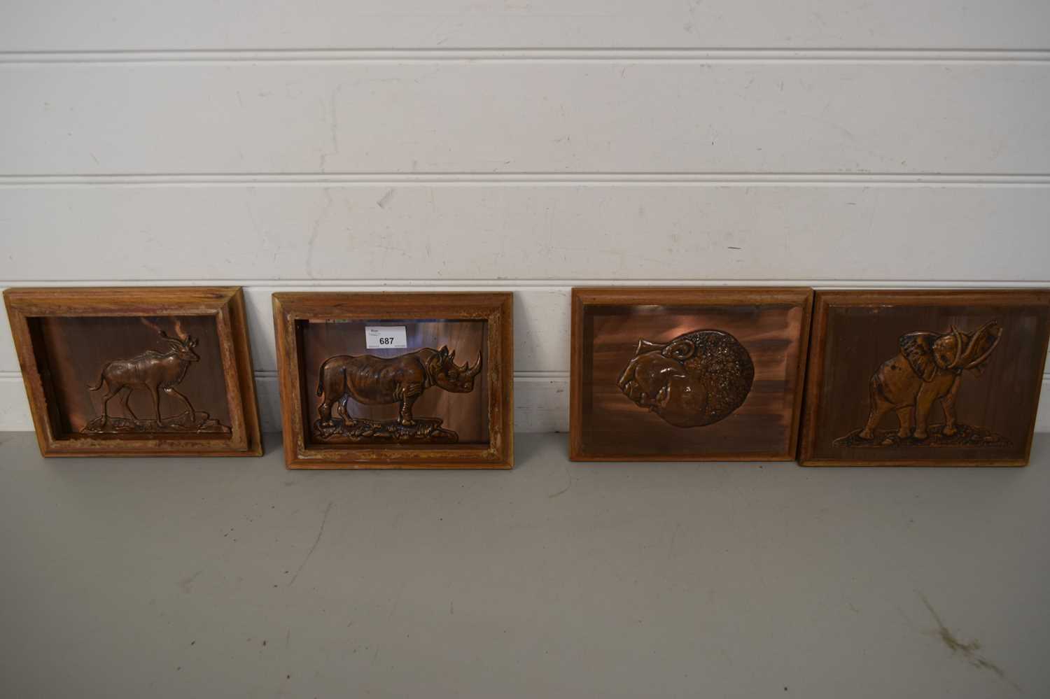 FOUR MODERN AFRICAN COPPER WALL PLAQUES