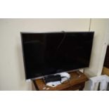 SMALL SONY FLAT SCREEN BRAVIA TV WITH INTEGRAL STAND