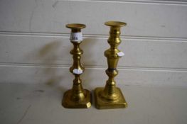 TWO BRASS CANDLESTICKS