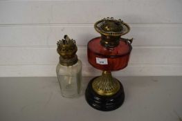 OIL LAMP WITH CRANBERRY GLASS FONT AND ONE OTHER (2)