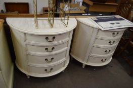 TWO MODERN LIGHT WOOD DEMI-LUNE FOUR DRAWER CHESTS