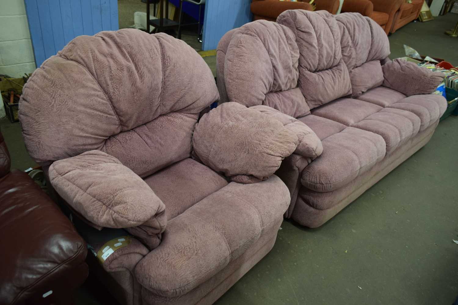 MAUVE THREE SEATER SOFA AND MATCHING ARMCHAIR