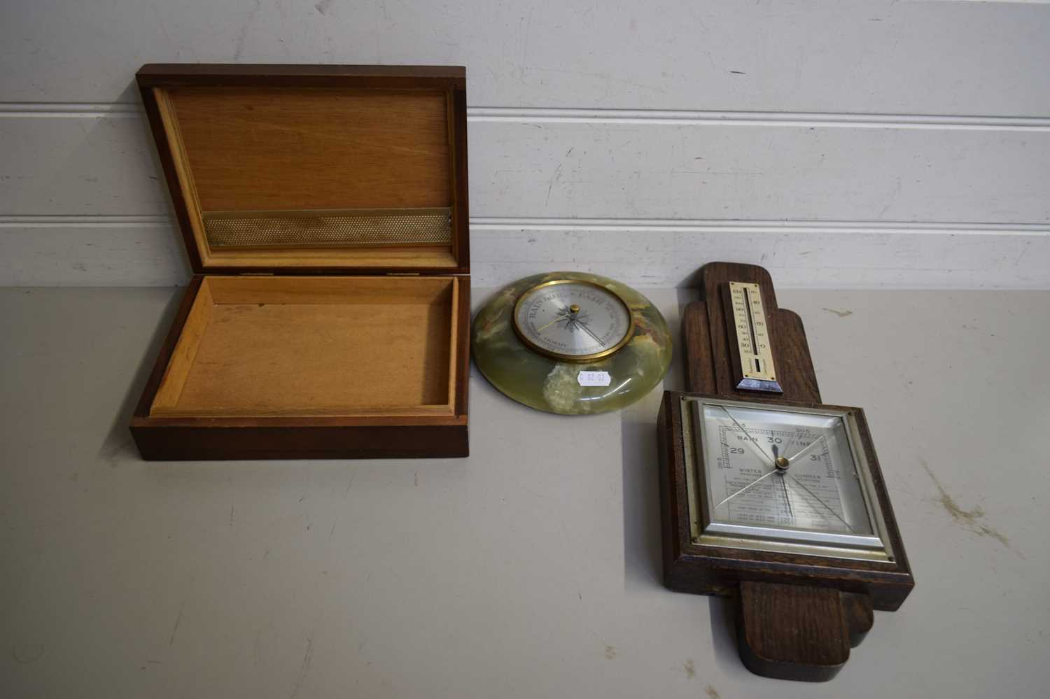 MIXED LOT COMPRISING TWO BAROMETERS AND A CIGAR CASE