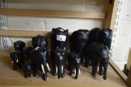 COLLECTION OF TWELVE VARIOUS EBONY ELEPHANTS