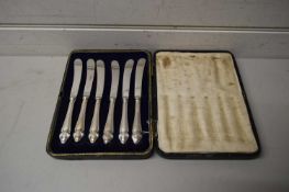 CASED SET OF SIX BUTTER KNIVES WITH SILVER MOUNTED HANDLES