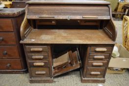 EARLY 20TH CENTURY OAK ROLL FRONT DESK, 127CM WIDE (A/F)