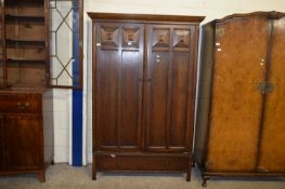 EARLY 20TH CENTURY OAK WARDROBE WITH TWO PANELLED DOORS OVER A SINGLE DRAWER BASE, 191CM HIGH