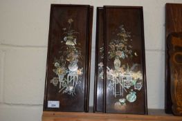 SET OF FOUR CHINESE HARDWOOD AND MOTHER OF PEARL INLAID WALL PLAQUES, 39CM HIGH