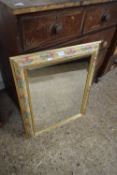 MODERN BEVELLED WALL MIRROR SET IN A FLORAL DECORATED FRAME, 74CM HIGH