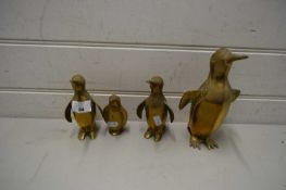 FOUR BRASS PENGUINS