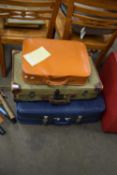 FOUR SUITCASES