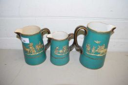 GRADUATED SET OF THREE VICTORIAN JUGS DECORATED WITH ROMAN CHARIOTS