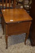 WALNUT VENEERED FLIP-TOP SEWING BOX ON CABRIOLE LEGS