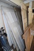 LARGE COLLECTION OF VARIOUS 19TH CENTURY PANELLED INTERIOR DOORS