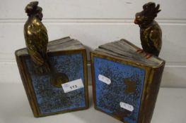 PAIR OF BOOKENDS WITH PARROTS PERCHED ON BOOKS