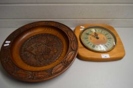WALL CLOCK IN WOODEN FRAME TOGETHER WITH A LARGE WOODEN CIRCULAR TRAY CARVED WITH OAK LEAVES