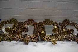 FOUR METAL WALL MOUNTS WITH CANDLE HOLDERS, INSET WITH SMALL MIRRORS (4)