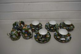 JAPANESE PORCELAIN COFFEE SET, CUPS, SAUCERS, DECORATED WITH ROUNDELS ON GREEN