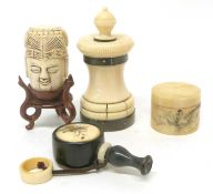 Group of ivories including carved head, small ivory pill box with decoration of lady amongst clouds,