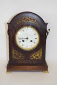 Late 19th century mahogany cased mantel or bracket clock, the arched case with pierced brass