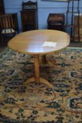 Charles Matts Originals extending oval oak dining table set on two turned columns with splayed legs,
