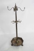 Unusual steel umbrella and coat stand with octagonal drip tray base with paw feet, 133cm high