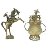 Two Ashanti metal wares including a warrior on horseback, together with a further melting pot, the