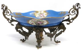 Large 19th century Sevres type centrepiece, the blue ground with gilt decoration with panels of