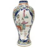 18th century Chinese porcelain baluster vase with cartouche of Chinese family surrounded by floral