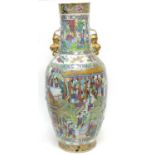 Large 19th century Cantonese vase with famille rose panelled decoration of figures, 63cm high (